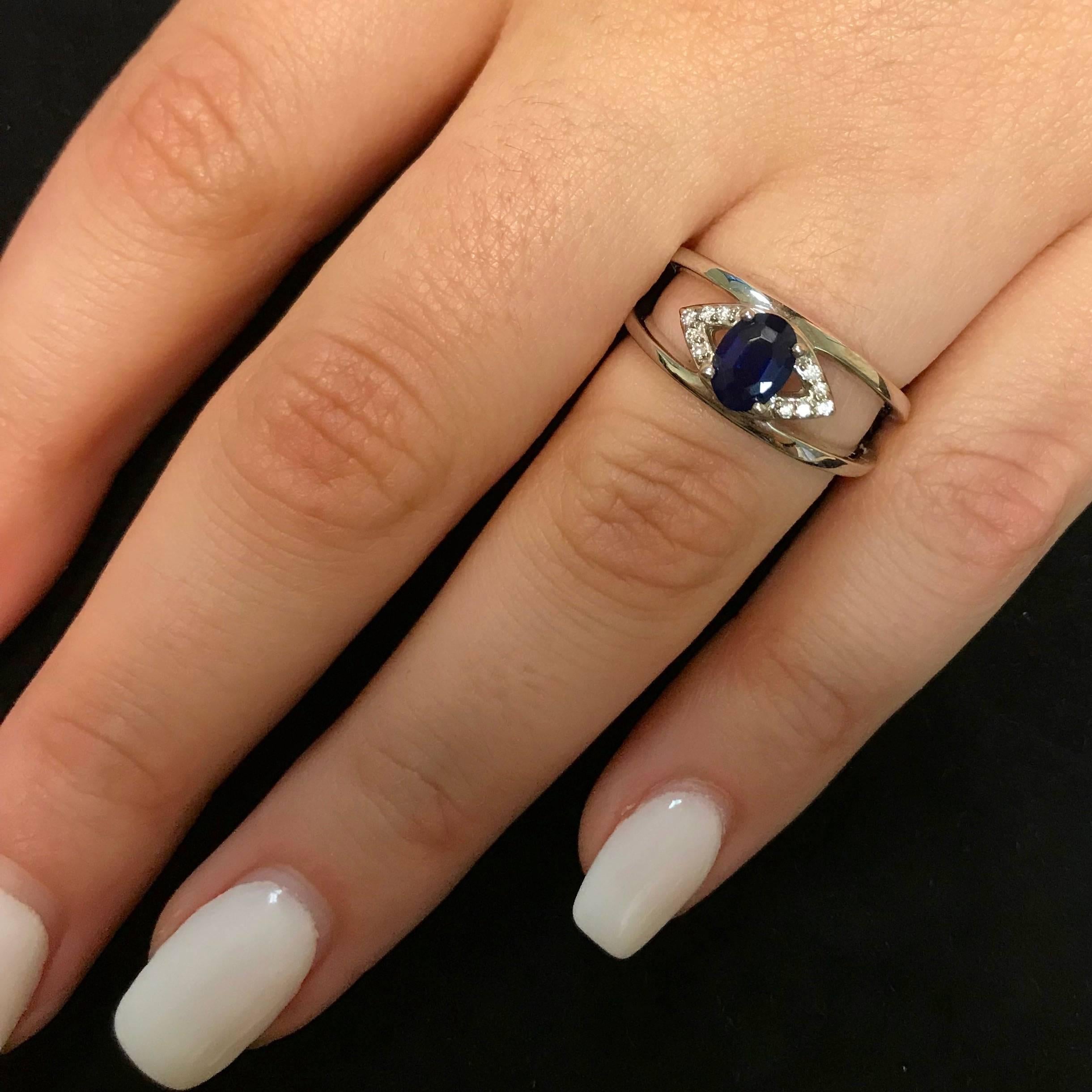 Contemporary 0.93 Carat Oval Cut Sapphire and White Diamond Ring