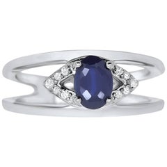 0.93 Carat Oval Cut Sapphire and White Diamond Ring