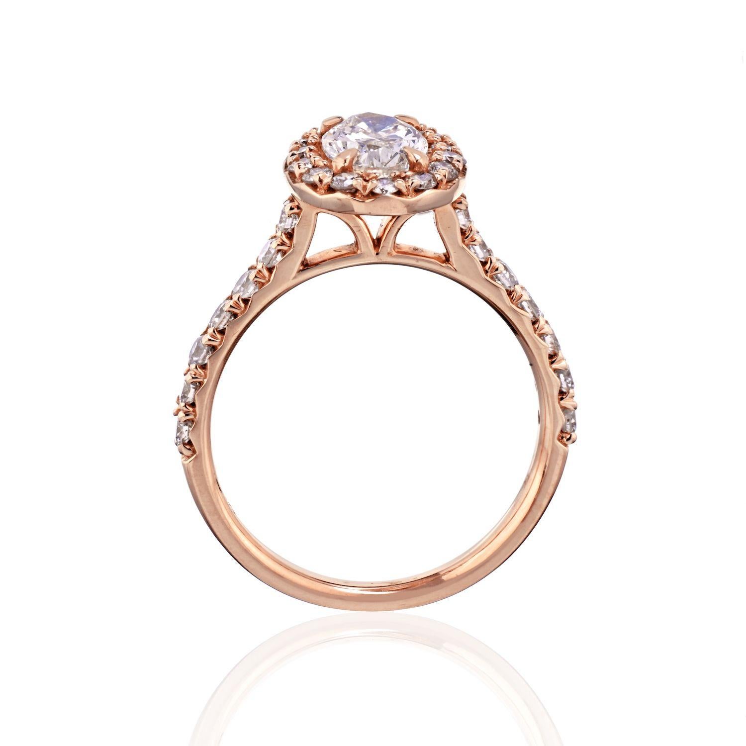 Oval Cut rose gold engagement ring set with a 0.93 carat Oval Diamond of G color and SI2 clarity, certified. 
Halo diamonds are of a roundcut and total in 0.66 carats tw. 
Certificate: EGLA
Finger Size: 6.5
