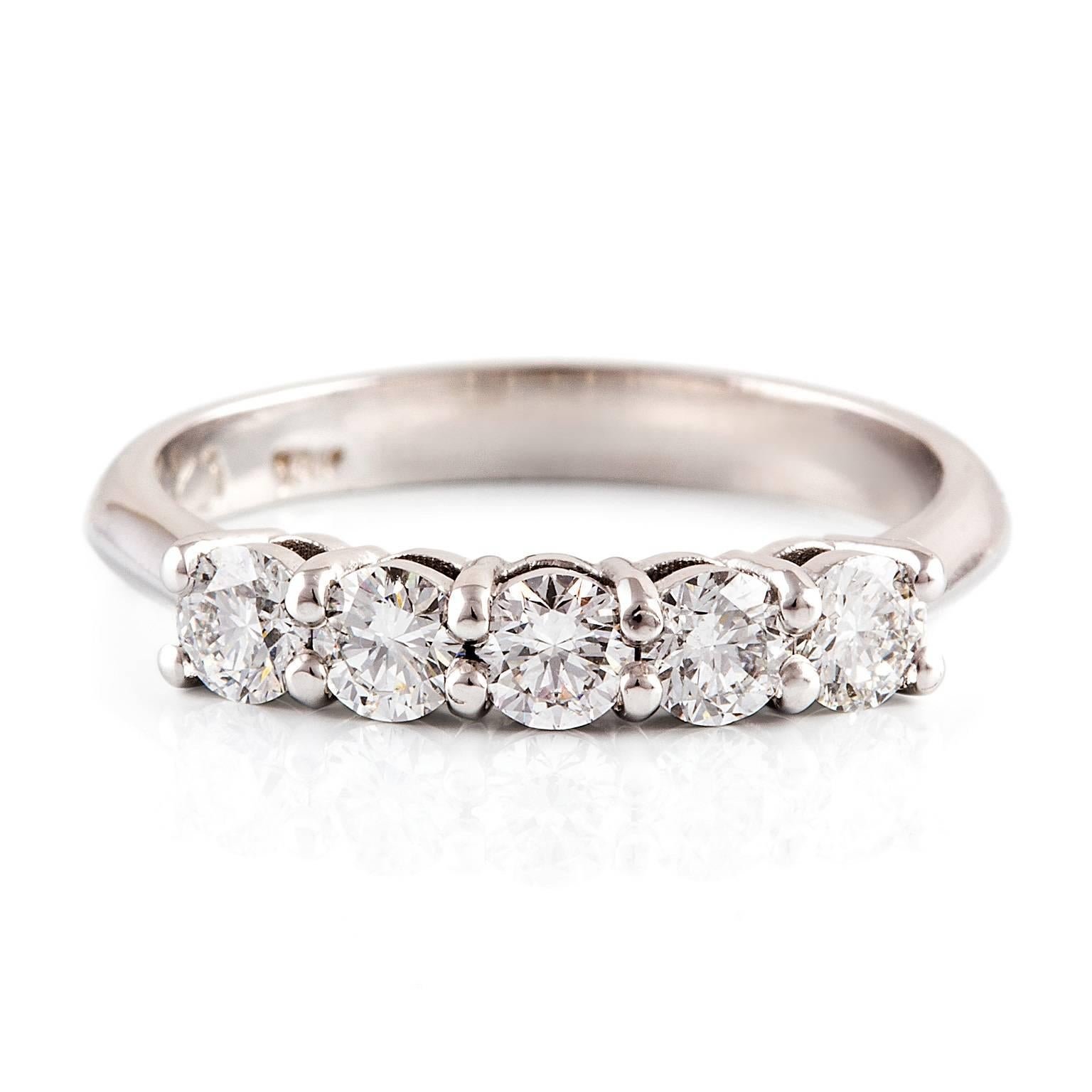 Bianca Eternity Ring

Simple, timeless, stunning. This 18ct white gold eternity ring is set with five lovely diamonds. This design also makes the perfect dress or other special commitment ring.

Round brilliant cut diamonds: F colour, VS clarity,
