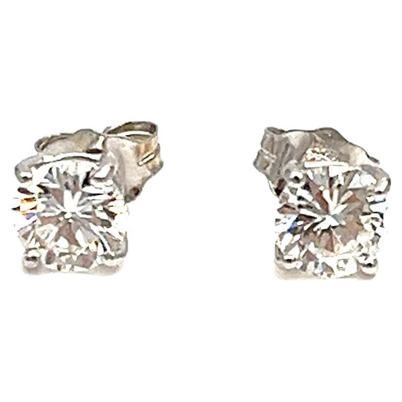These gorgeous 0.93 ct diamond stud earrings are F/G in color and VS1/VS2 in clarity.