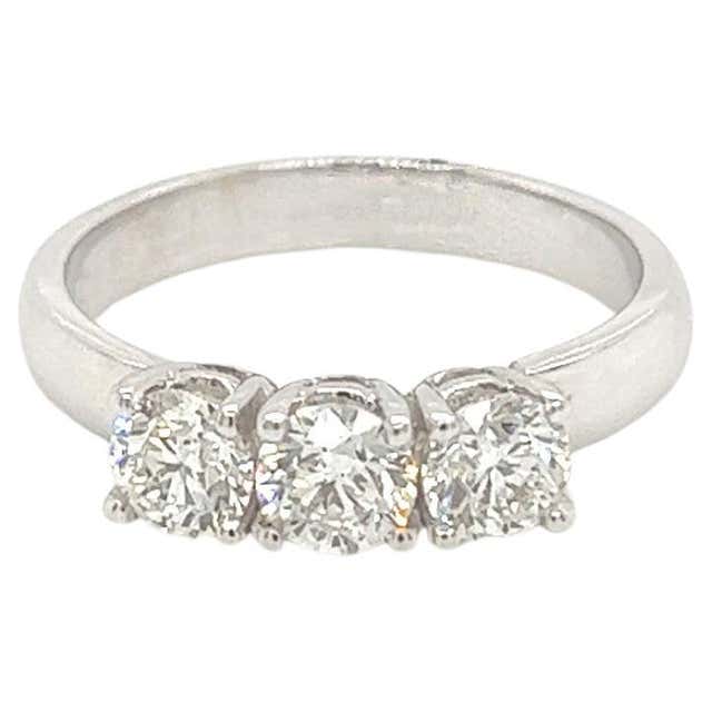 Modern Diamond Three-Stone Ring Set in Platinum, Trilogy Design at 1stDibs