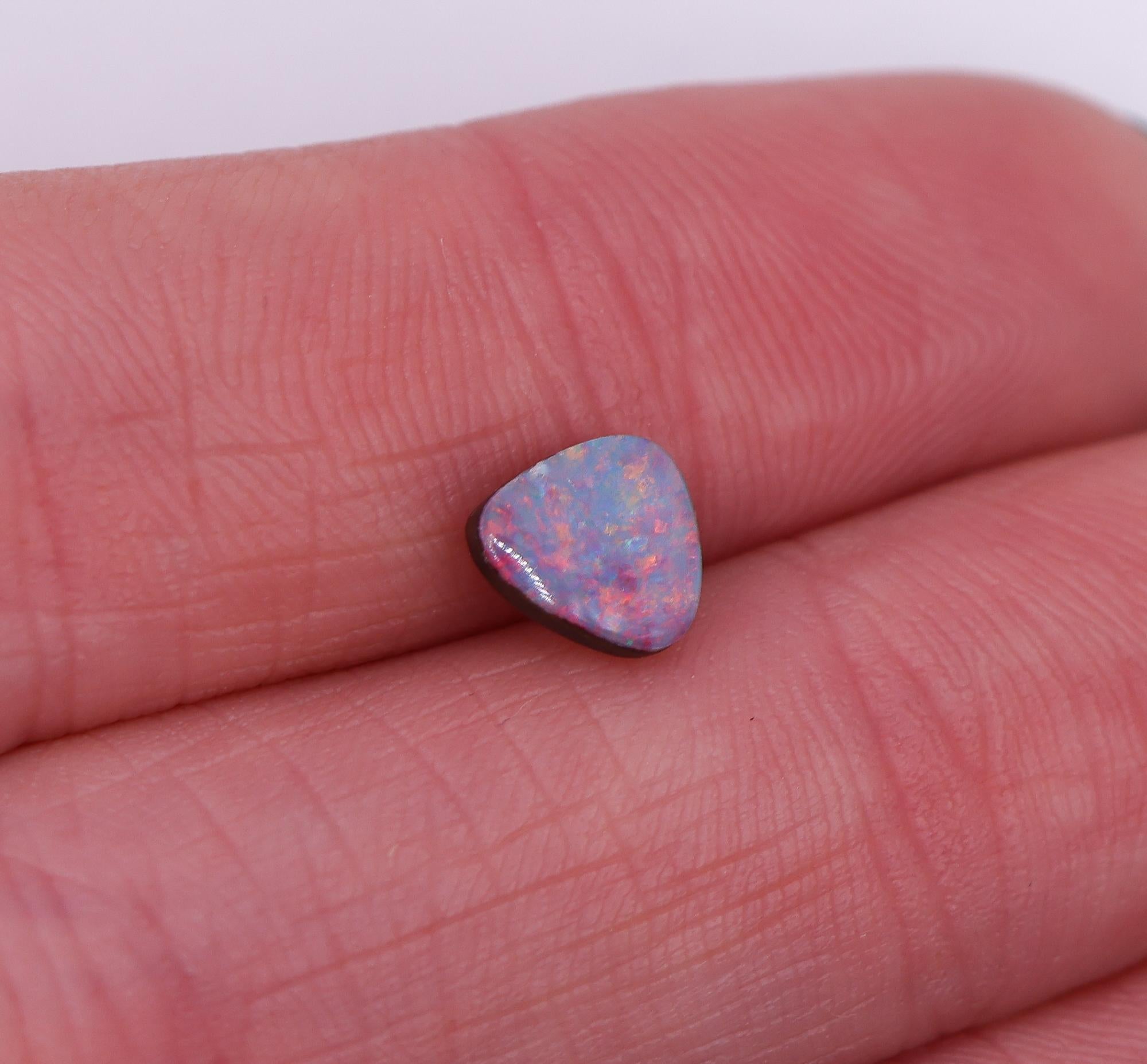 0.94 Carat Australian Boulder Opal Loose Gemstone Trillion 7x6.5mm For Sale 5