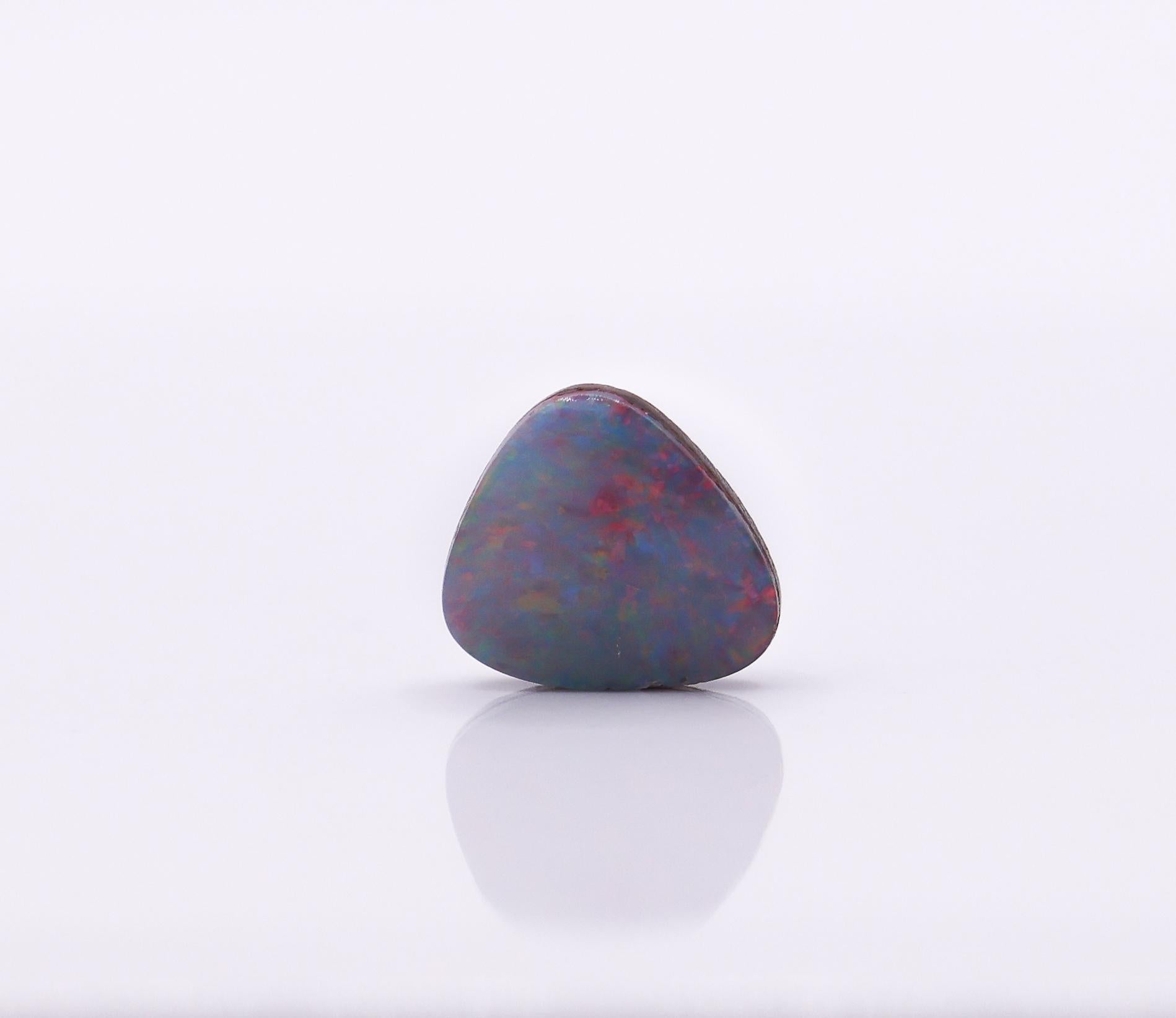 Women's or Men's 0.94 Carat Australian Boulder Opal Loose Gemstone Trillion 7x6.5mm For Sale