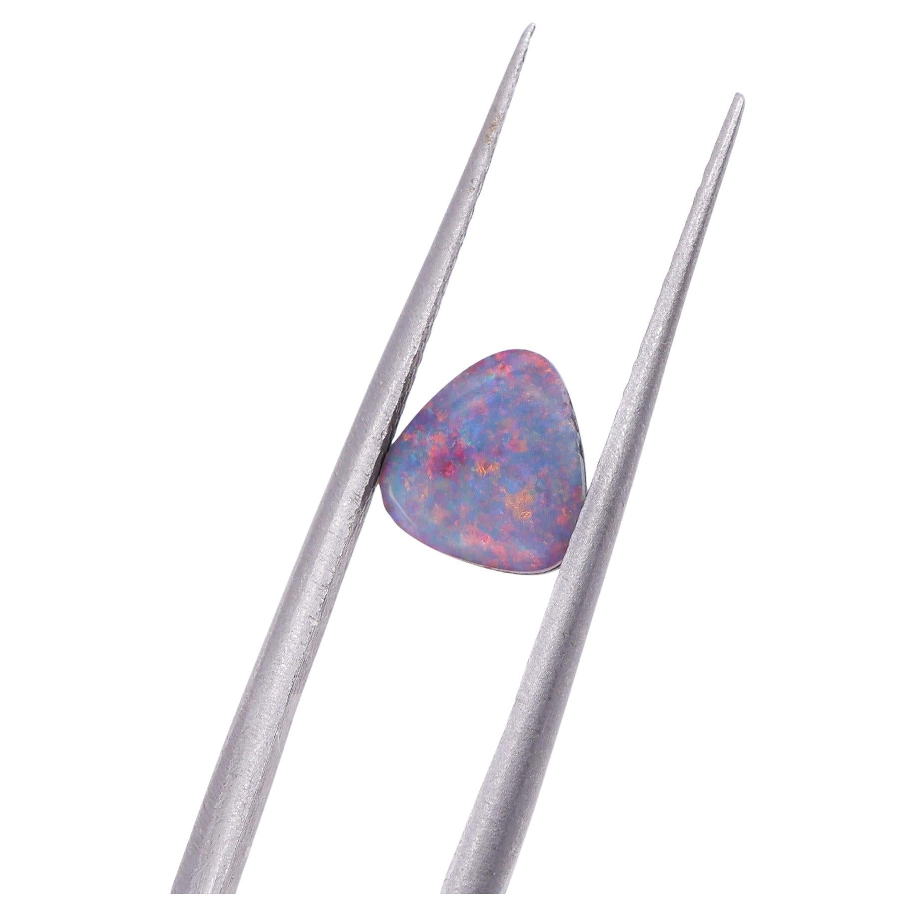 0.94 Carat Australian Boulder Opal Loose Gemstone Trillion 7x6.5mm For Sale