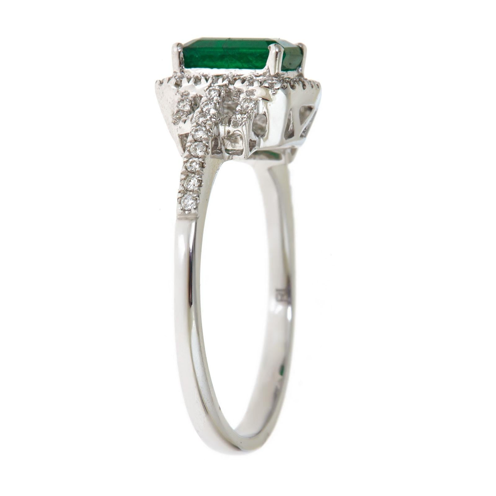 This beautiful Natural Emerald Ring is crafted in 14-karat White gold and features a 0.94 carat 1 Pc Emerald and 48 Pcs Round White Diamonds in GH- I1 quality with 0.18 Ct in a prong-setting. 
This Ring comes in sizes 6 to 9, and it is a perfect