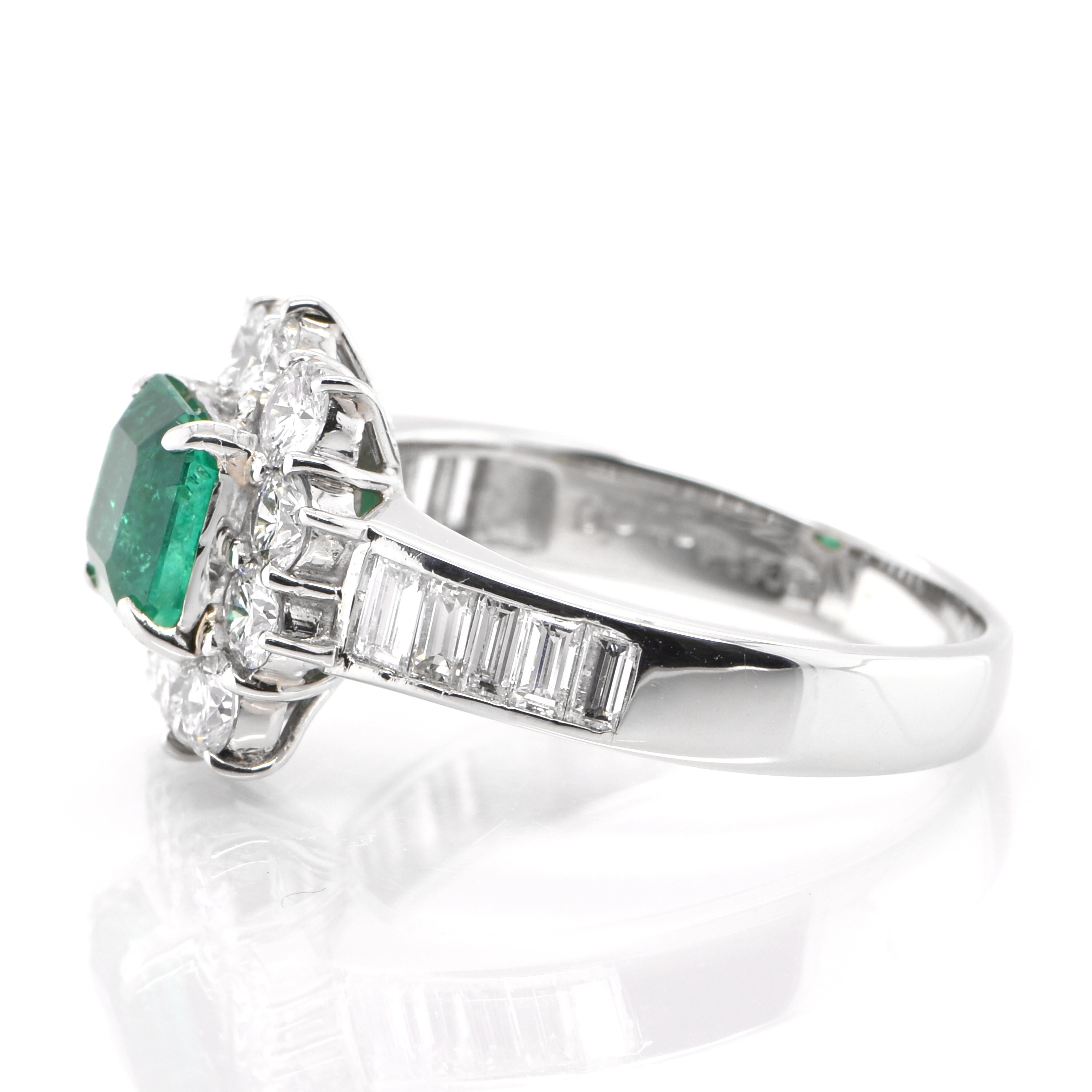 Emerald Cut 0.94 Carat Natural Emerald and Diamond Halo Ring Set in Platinum For Sale