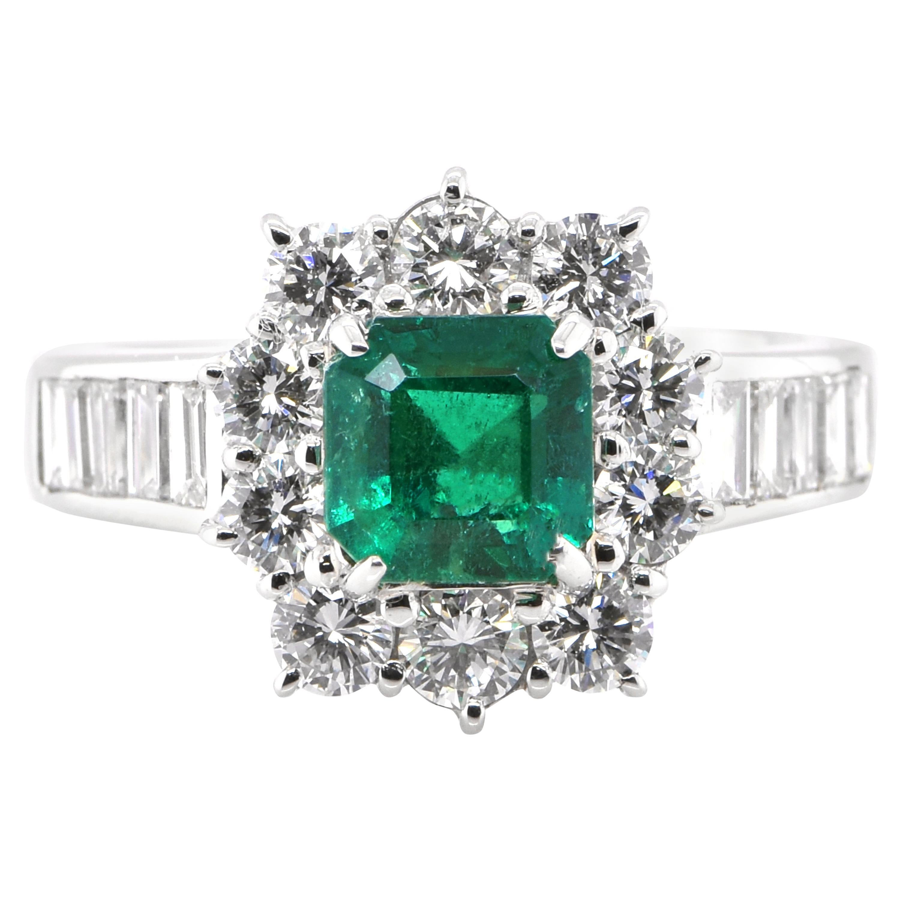 0.94 Carat Natural Emerald and Diamond Halo Ring Set in Platinum For Sale