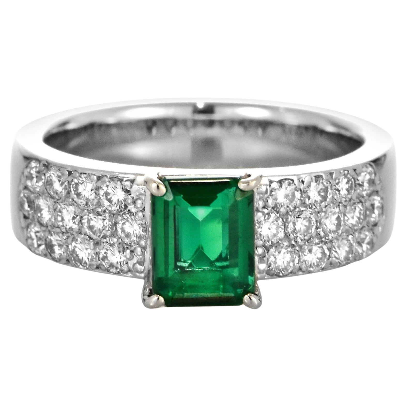 0.94 Carat Natural, Vivid Green Emerald and Diamond Ring made in Platinum