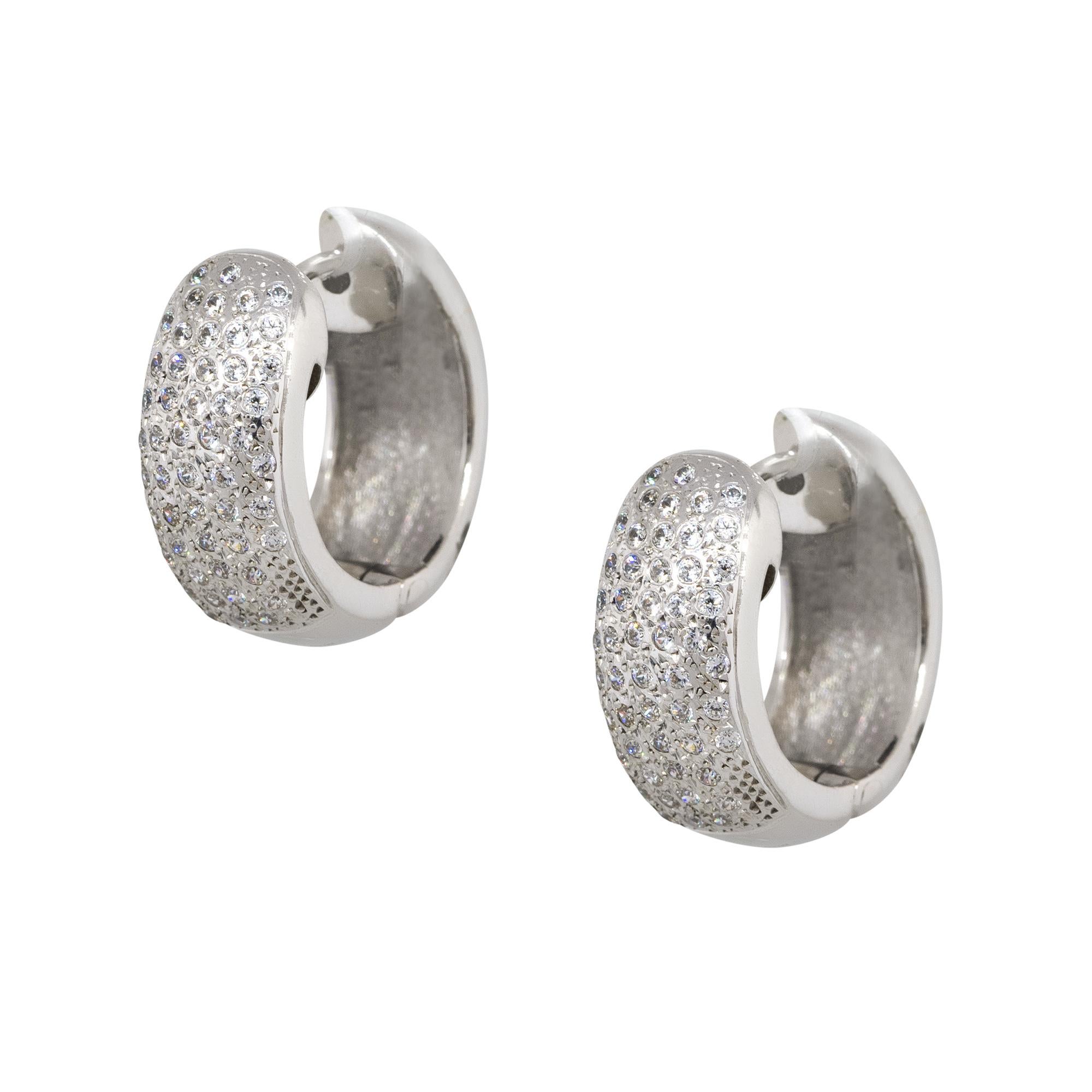 Style: Huggie Earrings
Material: 14k white gold
Diamond Details: Approx. 0.94ctw of round cut diamonds. Diamonds are G/H in color and VS in clarity.
Fastening: Hinged backs
Weight: 11.2g (7.2dwt) 
Earring Measurements: 19mm x 8mm x 18mm
Comes with:
