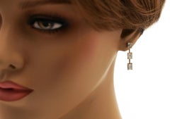 Pendientes colgantes de oro amarillo de 14 quilates con 0,94 quilates de diamantes