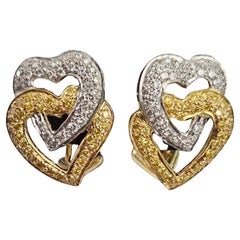 Boucles d'oreilles cœur en diamants blancs et canari de 0,94 carat