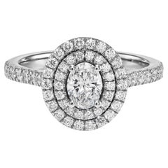 0.94 tcw Oval Natural Diamond in 14k White Gold Engagement Ring