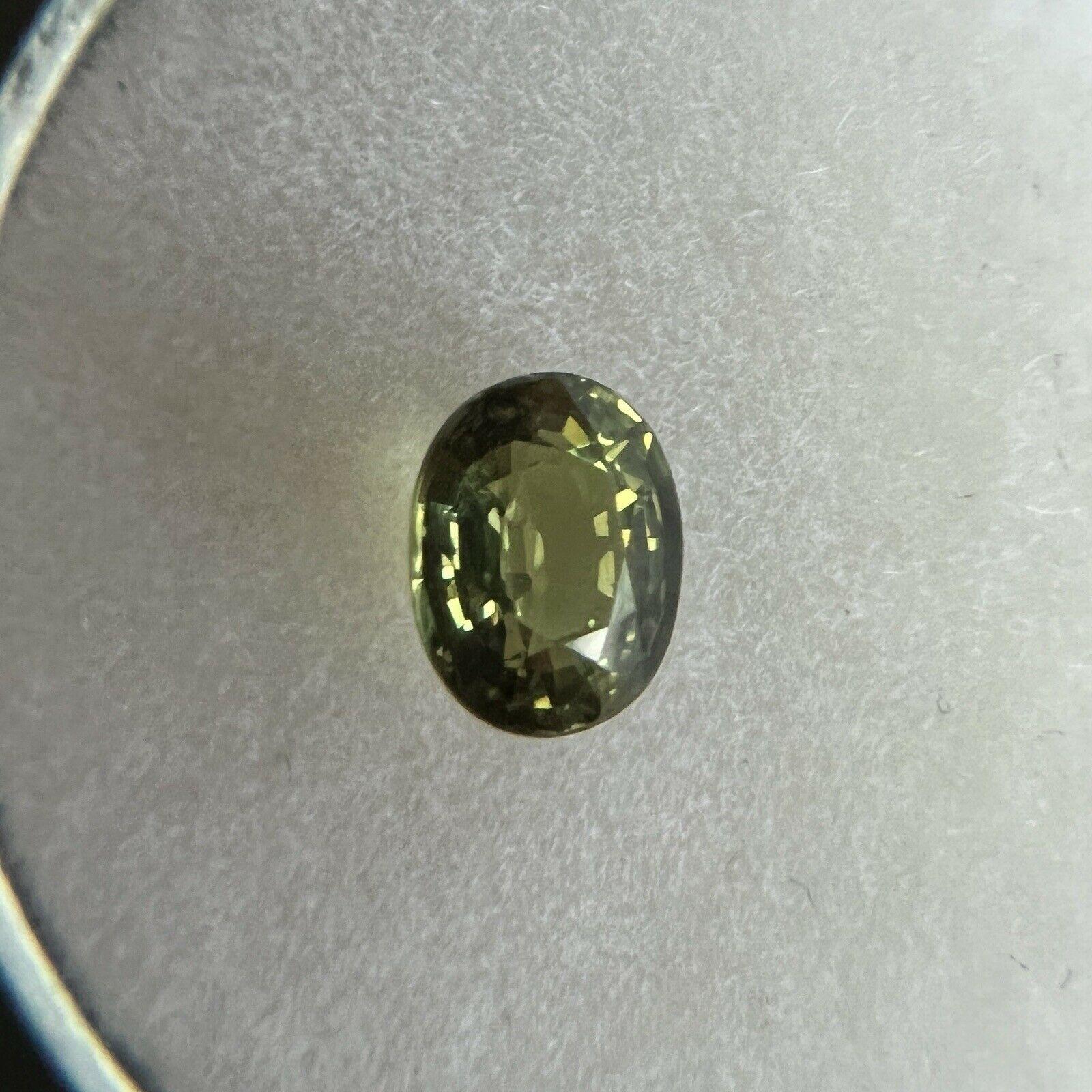 0.94ct Green Yellow Australian Sapphire Untreated Oval Cut 6 x 4.7mm No Heat

Fine Natural Yellow Green Sapphire Gemstone. 
0.94 Carat with a beautiful vivid green yellow colour and excellent clarity, a very clean stone. 
Also has an excellent oval