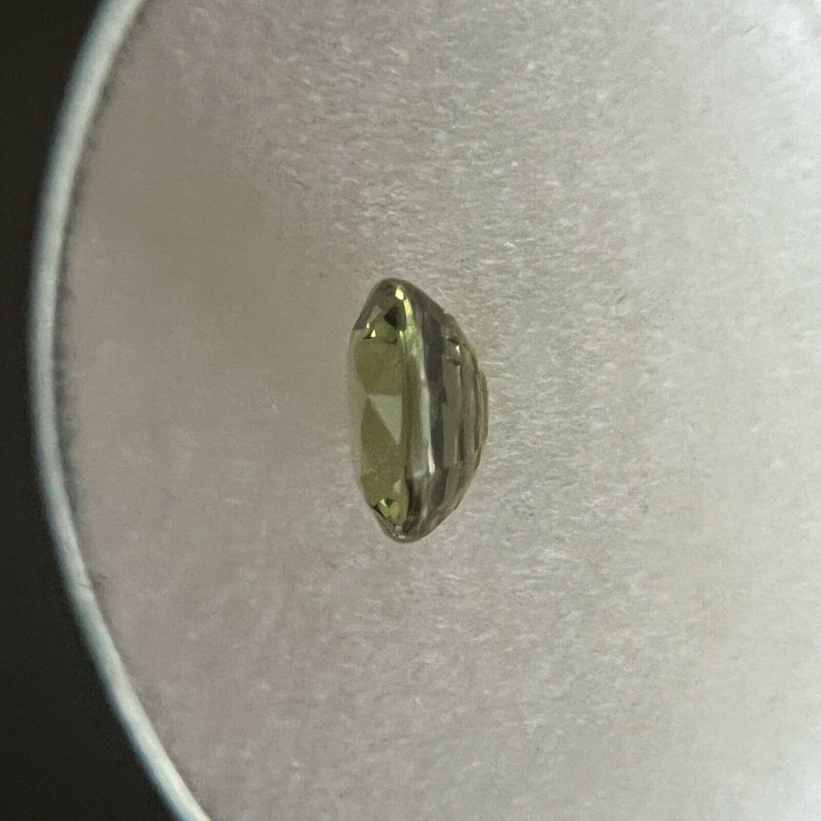 Women's or Men's 0.94ct Green Yellow Australian Sapphire Untreated Oval Cut No Heat For Sale