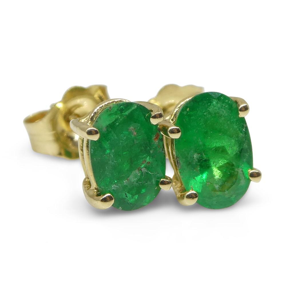 0.94ct Oval Green Colombian Emerald Stud Earrings set in 14k Yellow Gold For Sale 4