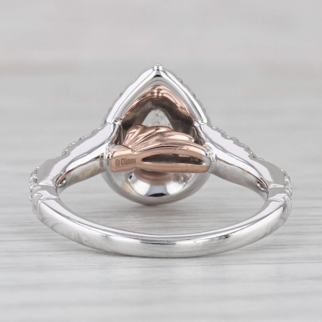 Informationen zu Edelsteinen:
- Naturdiamant - Zentrum
Karat - 0,35ct 
Schliff - Birnenbrillant
Farbe - H
Reinheit - SI2 

- Natürliche Diamanten - Halos
Karat gesamt - 0,30ctw
Schliff - Rundbrillant
Farbe - G - H
Reinheit - VS2 - SI1

- Natürliche