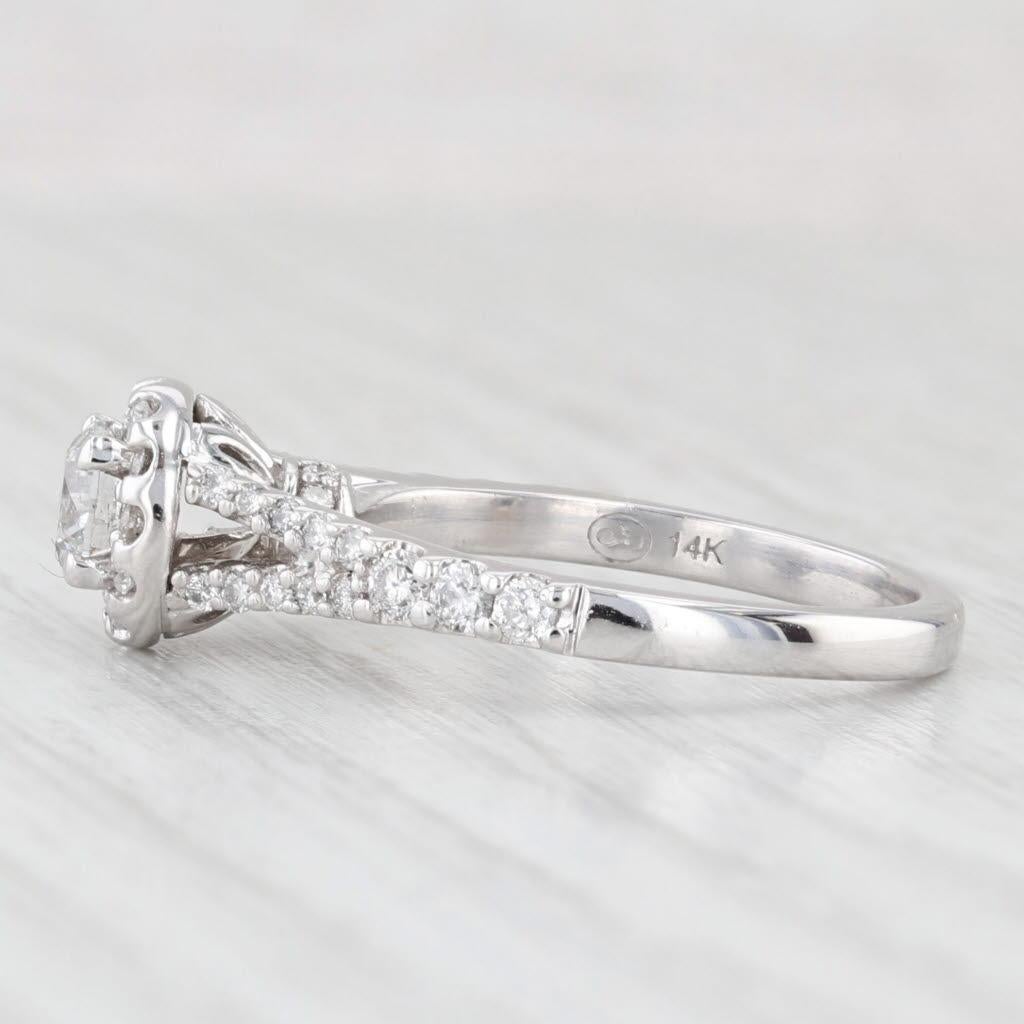 Información sobre la gema:
- Diamante natural -
Quilates - 0.52ct 
Talla - Redonda brillante
Color - F
Claridad - I2
GIA - 2205006079 

- Diamantes naturales -
Quilates totales - 0,42ctw
Talla - Redonda brillante
Color - G - H
Claridad - SI2 -