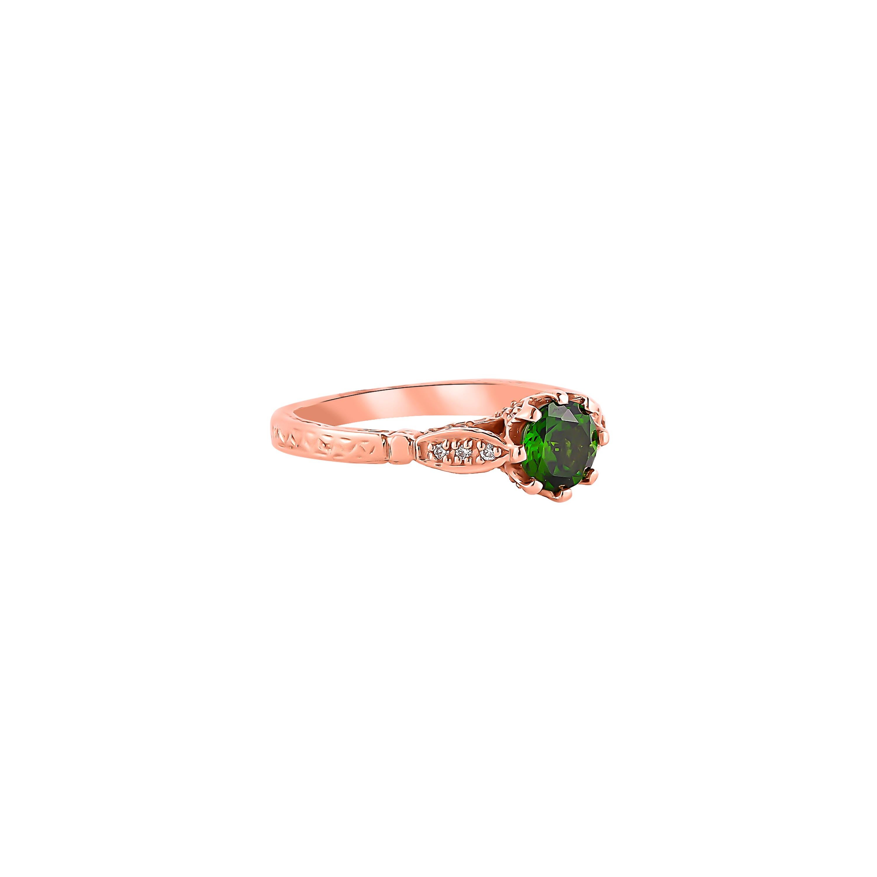 Unique and Designer Cocktail Rings by Sunita Nahata Fine Design.

Classic Chrome Diopside ring in 14K White gold with Diamond. 

Chrome Diopside: 0.95 carat, 6.00mm size, round shape.
Diamond: 0.15 carat, 1.10mm size, round shape, G colour, VS
