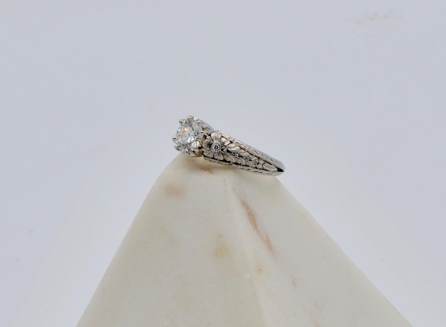 Romantic 0.95 Carat Diamond and Platinum Engagement Ring For Sale