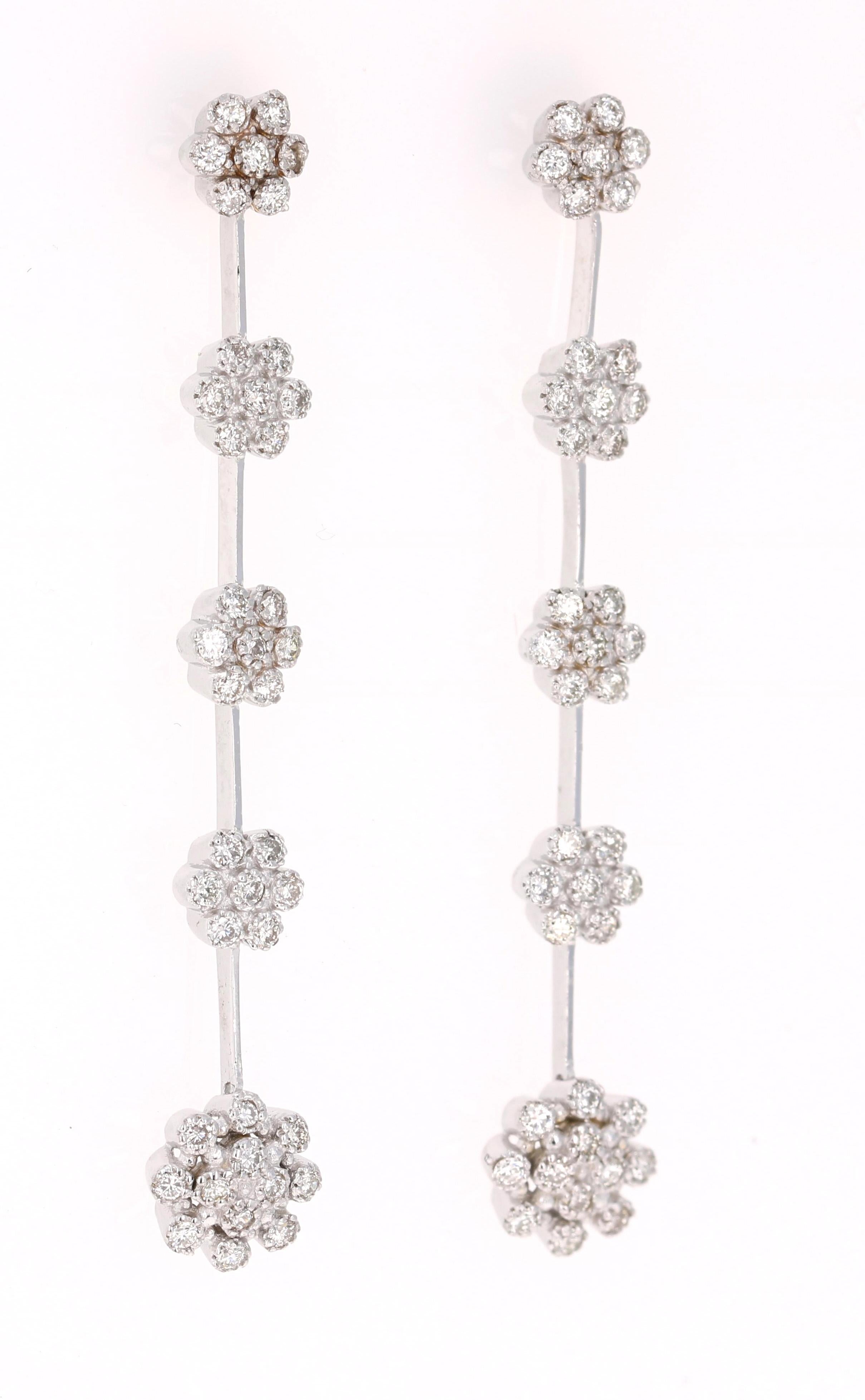 0.95 Carat Diamond Dangling 14 Karat White Gold Earrings

These delicate flower dangle earrings are sure to make a statement! 106 Round Cut Diamonds that weigh 0.95 Carats (Clarity: VS, Color: H)  

Made in 14K White Gold weighing approximately 5.7