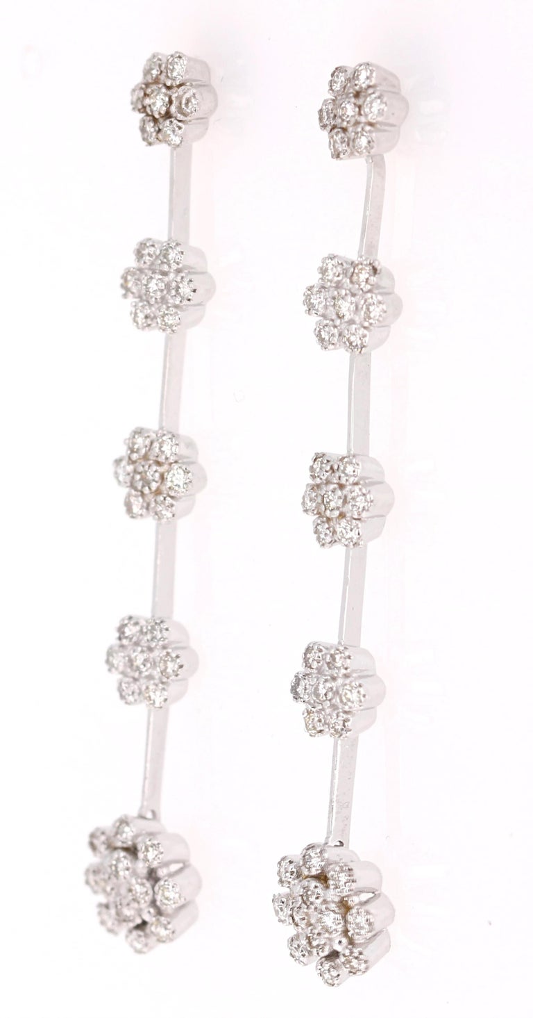 Modern 0.95 Carat Diamond Dangling 14 Karat White Gold Earrings For Sale
