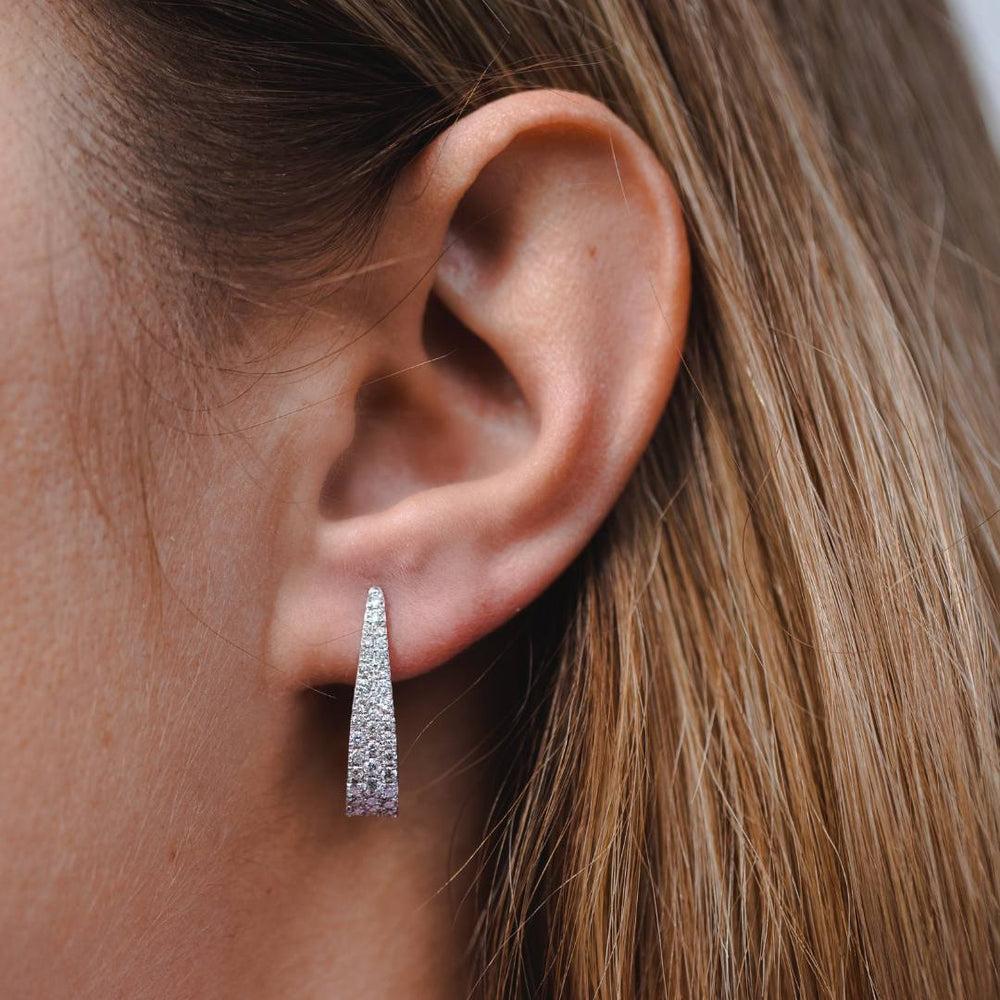 0.95 Carat Diamond Hoop Earrings in 14 Karat White Gold, Shlomit Rogel

Diamond hoops are always a timeless classic! Especially when they're as sparkly as this pair. Designed in 14k white gold and pavé set with 72 genuine white diamonds totaling