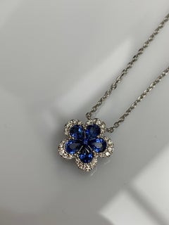 0.95 Carat Flower Sapphire and Diamond Pendant Necklace in 18K White Gold