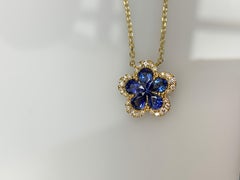 0.95 Carat Flower Sapphire and Diamond Pendant Necklace in 18K yellow Gold