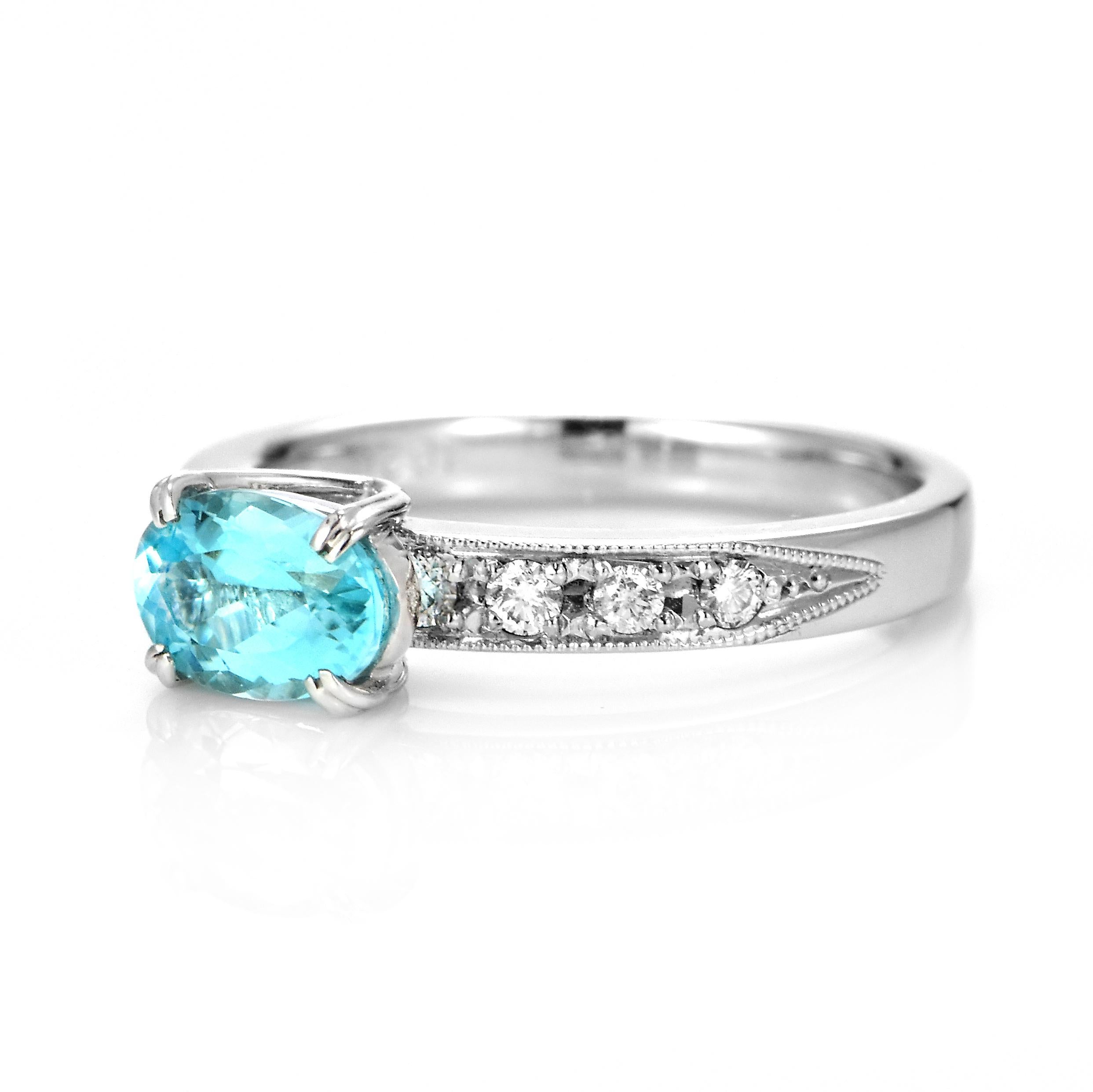 Modern 0.95 Carat Natural Paraiba Tourmaline and Diamond Ring Made in Platinum For Sale