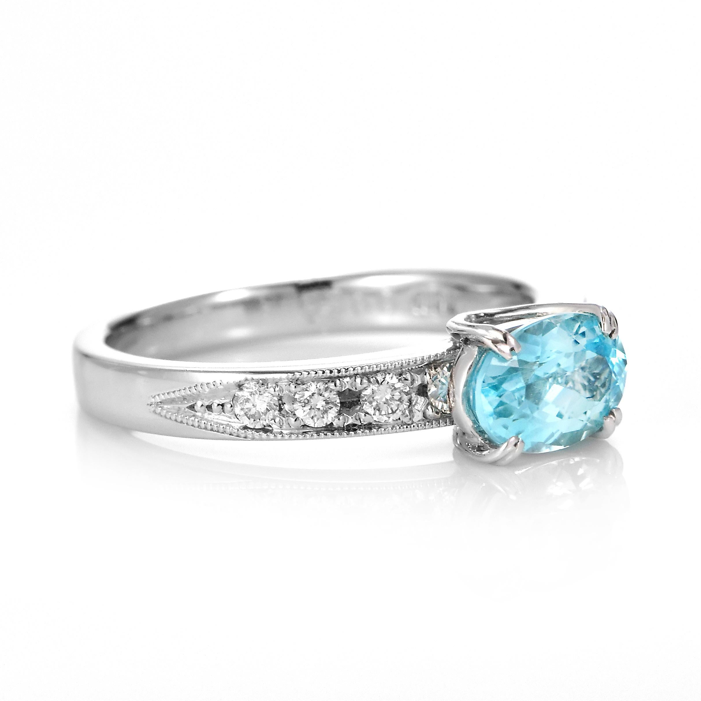 Oval Cut 0.95 Carat Natural Paraiba Tourmaline and Diamond Ring Made in Platinum For Sale
