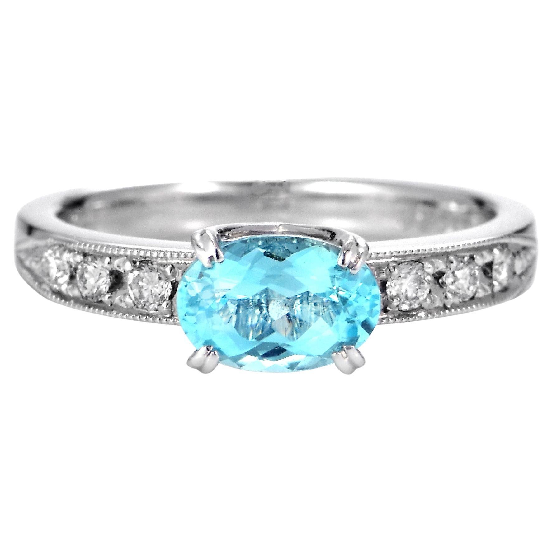 0.95 Carat Natural Paraiba Tourmaline and Diamond Ring Made in Platinum