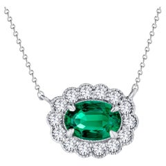 0.95 Carat Oval Emerald Pendant with 0.4 ct Diamond Halo in 18k White ref933