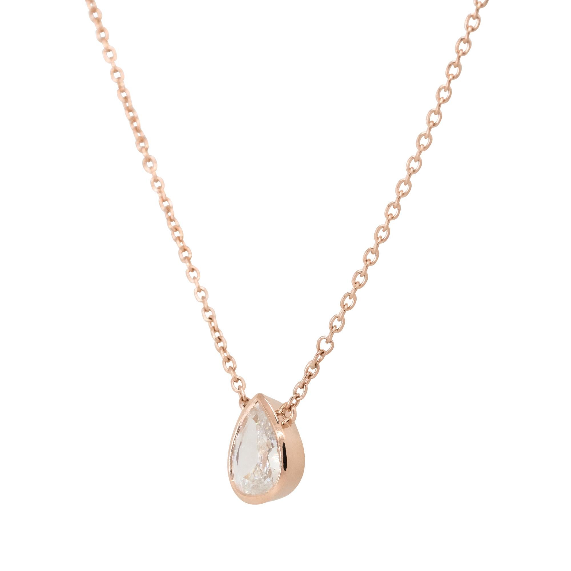 Material: 14k Rose Gold
Diamond Details: Approx. 0.95ctw pear shaped Diamond. Diamond is G in color and VS2 in clarity
Clasps: Lobster Clasp
Total Weight: 4.3g (2.8dwt) 
Pendant Measurements: 8.40mm x 10.90mm
Length: 18