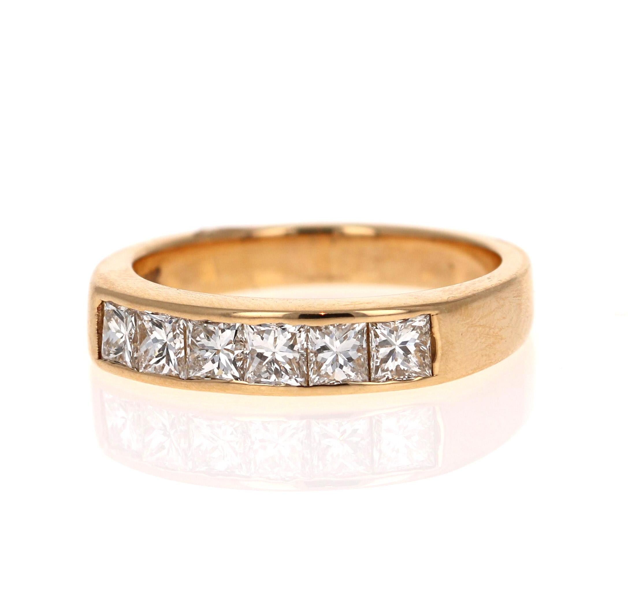 Beautiful Diamond Band with a lot of Bling bling! 

This band has 6 Princess Cut Diamonds weighing 0.95 Carats.  The Clarity and Color of the Diamonds is VS-F.

The ring is set in 18 Karat Yellow Gold and weighs approximately 5.5 grams.

The ring