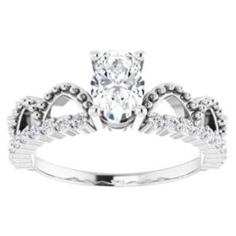 For Sale:  0.95 TCW Crown Inspired Oval Solitaire Engagement Ring