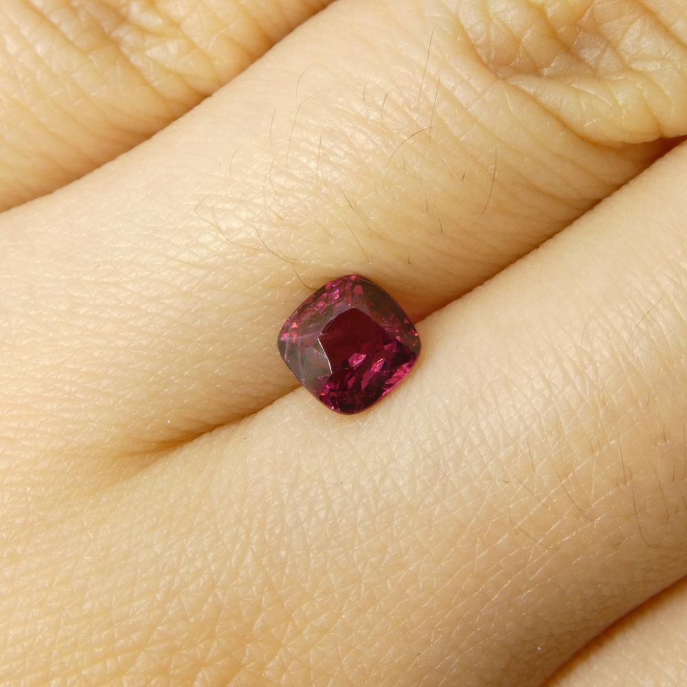 Description:

Gem Type: Jedi Spinel 
Number of Stones: 1
Weight: 0.95 cts
Measurements: 5.46 x 5.41 x 3.82 mm
Shape: Cushion
Cutting Style Crown: Brilliant Cut
Cutting Style Pavilion: Step Cut 
Transparency: Transparent
Clarity: Very Very Slightly