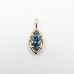 0.95CT Natural Blue Diamond Marquise Solstice Pendant in 14 Karat Yellow Gold