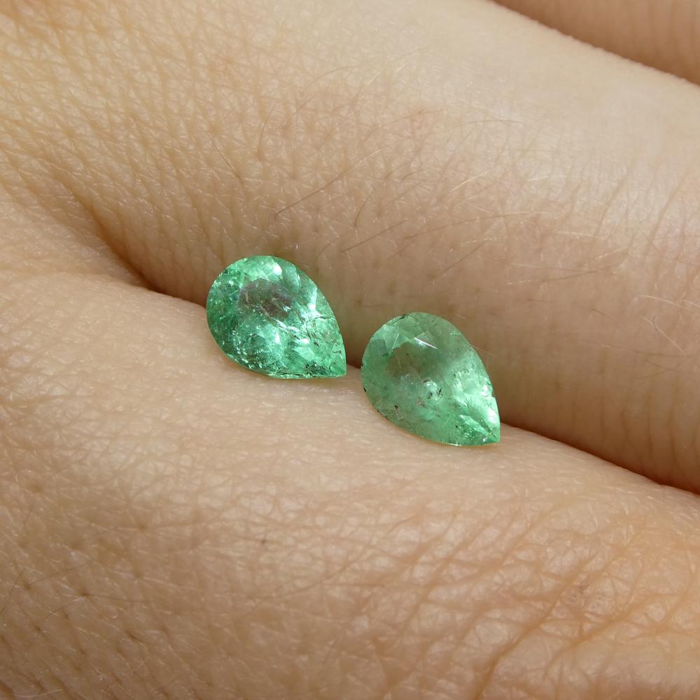0.95ct Pair Pear Green Emerald from Colombia For Sale 8