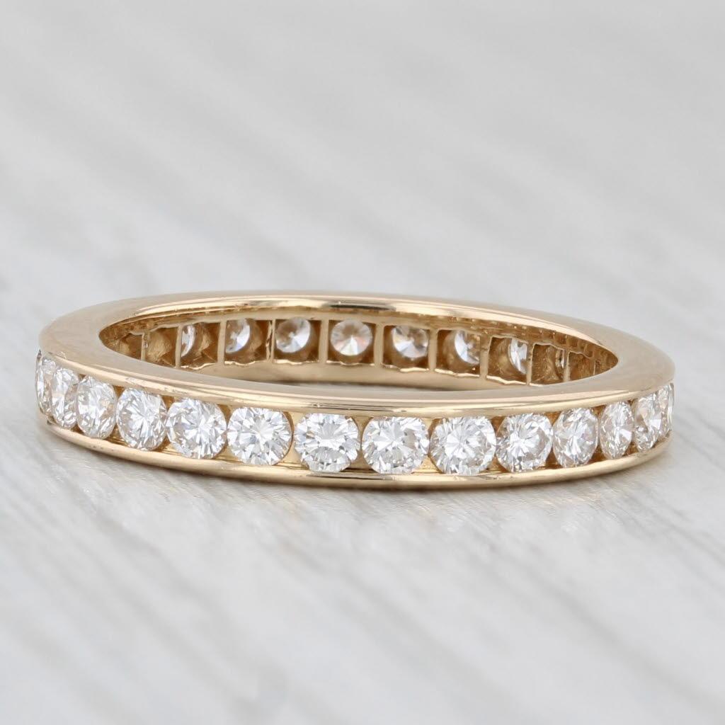 Gemstone Information:
- Natural Diamonds -
Total Carats - 0.95ctw
Cut - Round Brilliant
Color - G - H
Clarity - VS2

Metal: 18k Yellow Gold
Weight: 3.1 Grams 
Stamps: 18k 
Rise Above Finger: 2.2 mm
Band / Shank Width: 3 mm

This ring is a size 6