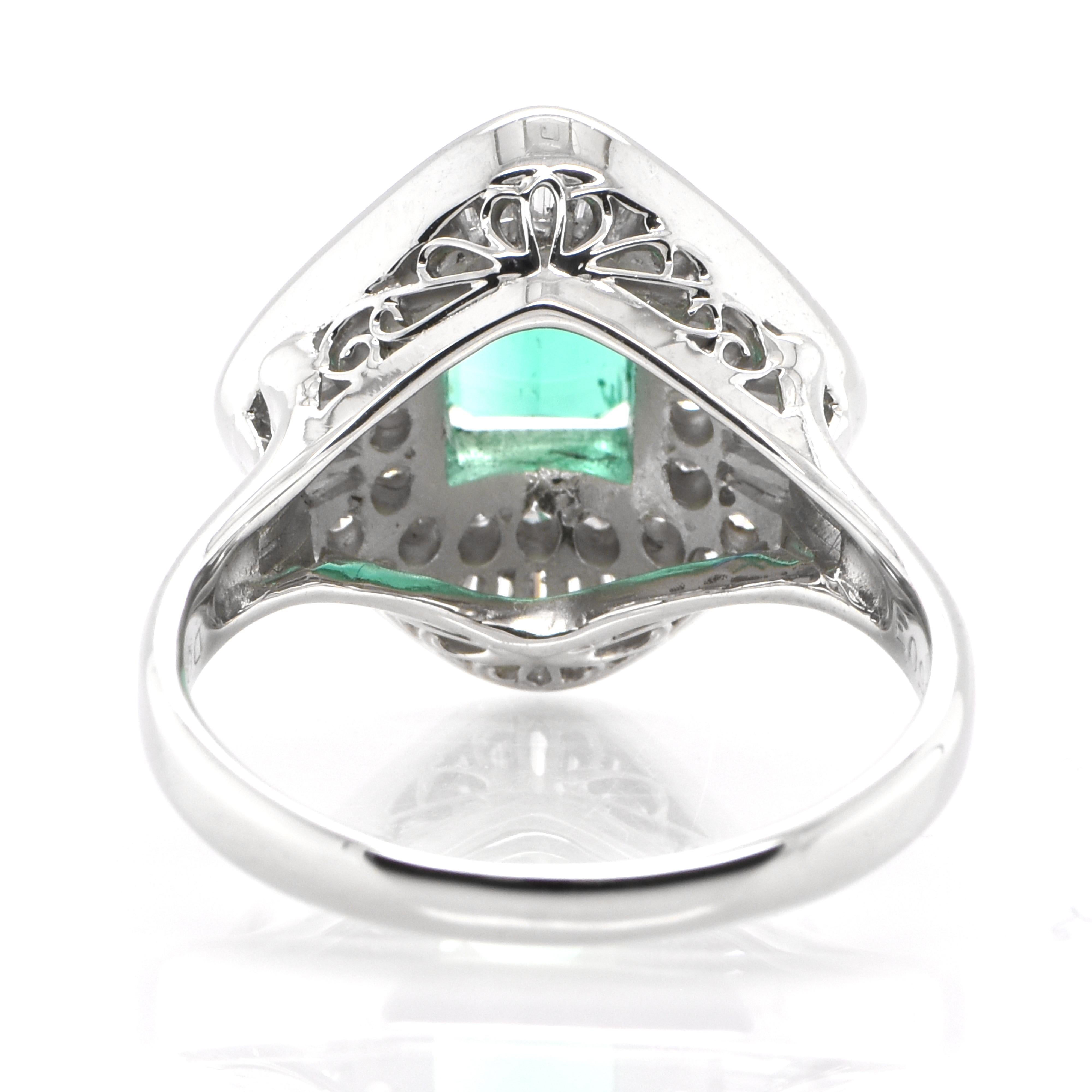 Women's  0.96 Carat Natural Emerald and Diamond Vintage Ballerina Ring set in Platinum For Sale