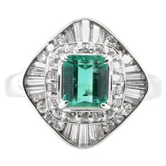 0.96 Carat Natural Emerald and Diamond Vintage Ballerina Ring set in Platinum