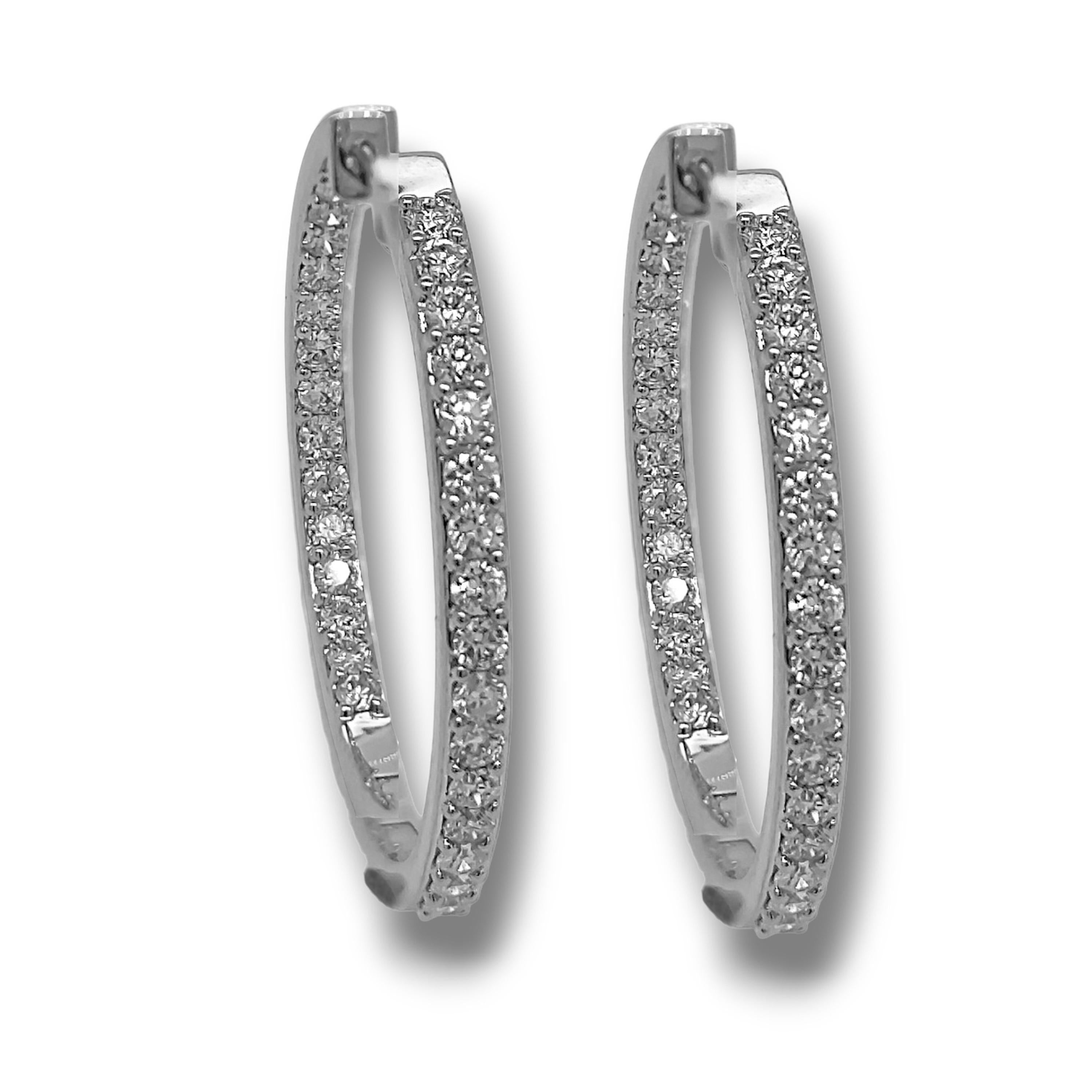 Orecchini a cerchio in oro bianco con diamante rotondo da 0,96 carati