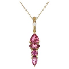 0.96 Carats Pink Tourmaline Diamonds set in 14K Yellow Pendant