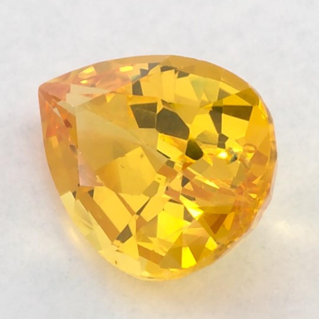 This natural Yellow sapphire offers elegance and sophistication. With its rich color saturation and precise cutting, it is the perfect centerpiece for an engagement ring or luxury jewelry design.

This sapphire originates from Sri Lanka (Ceylon),