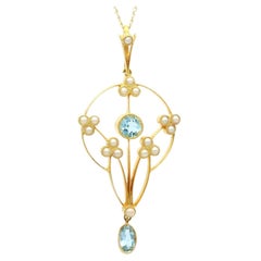 Pendentif Art Nouveau en or jaune 15K avec aigue-marine et perle de 0,96ct