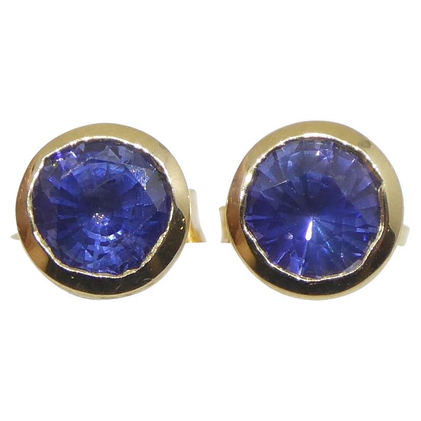 0.96ct Round Blue Sapphire Stud Earrings set in 14k Yellow Gold For Sale
