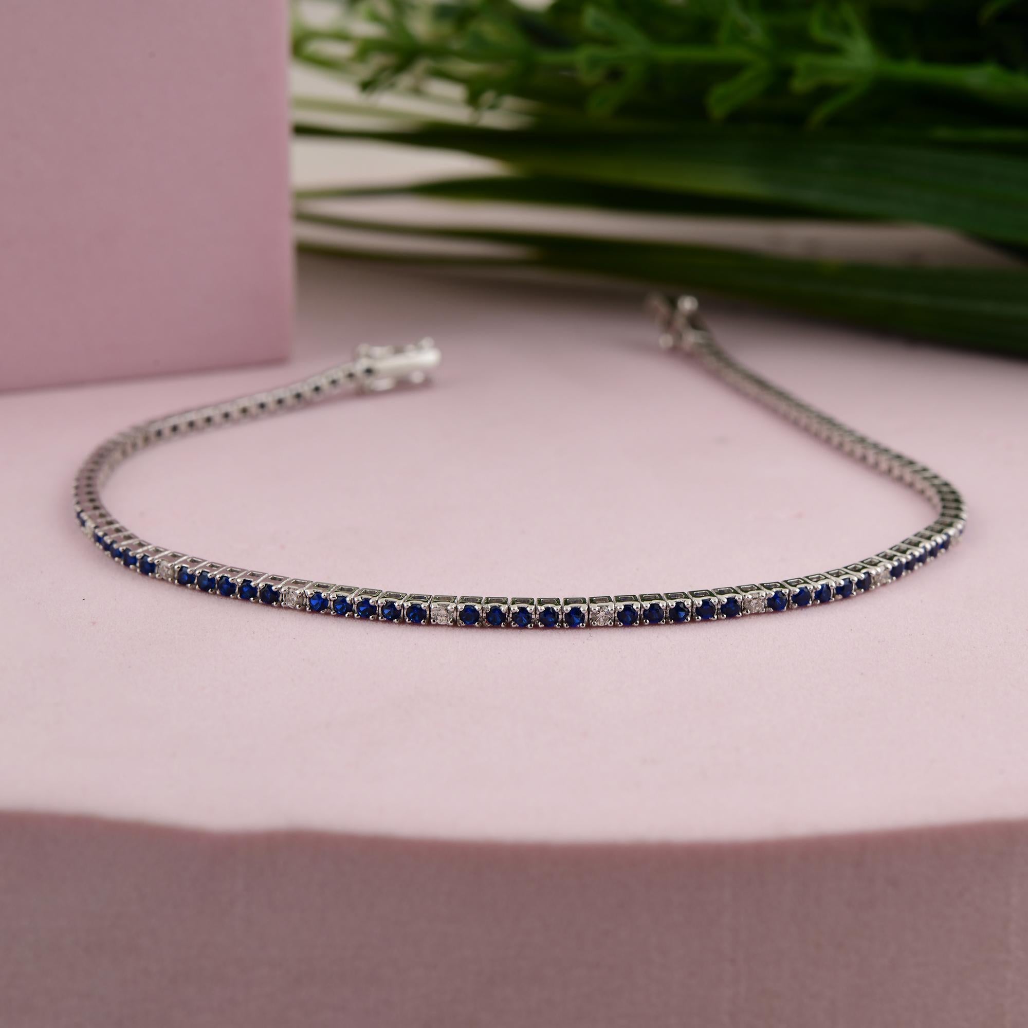 Cast from 10-karat gold, these exquisite bracelet is handset with 0.97 carats blue gemstone and 0.22 carats of sparkling diamonds.

FOLLOW SPECTRUM JEWELS storefront to view the latest collection & exclusive pieces. Spectrum Jewels is proudly rated