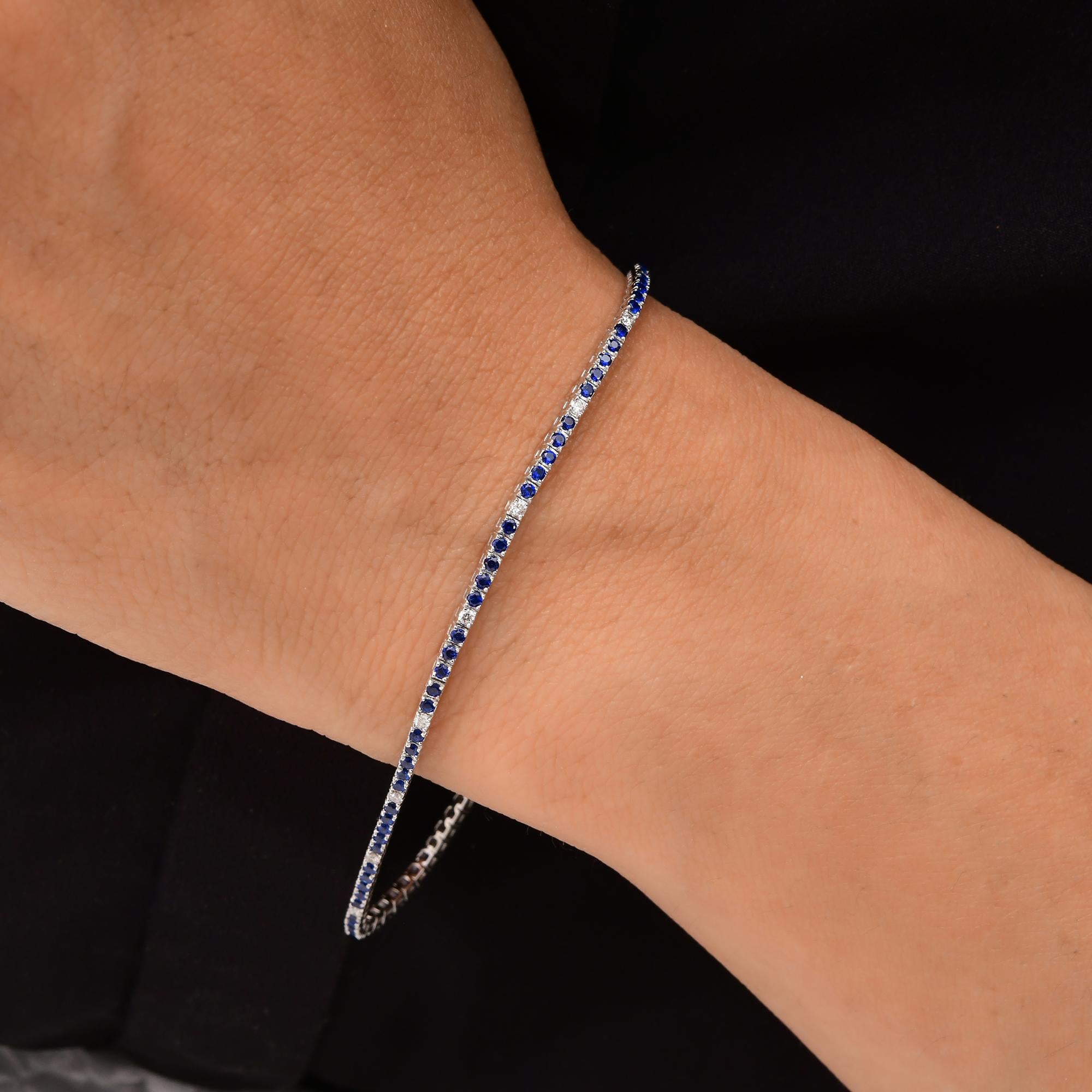 Modern 0.97 Carat Blue Gemstone Tennis Bracelet 0.2 Ct SI/H Diamond 10 Karat White Gold For Sale