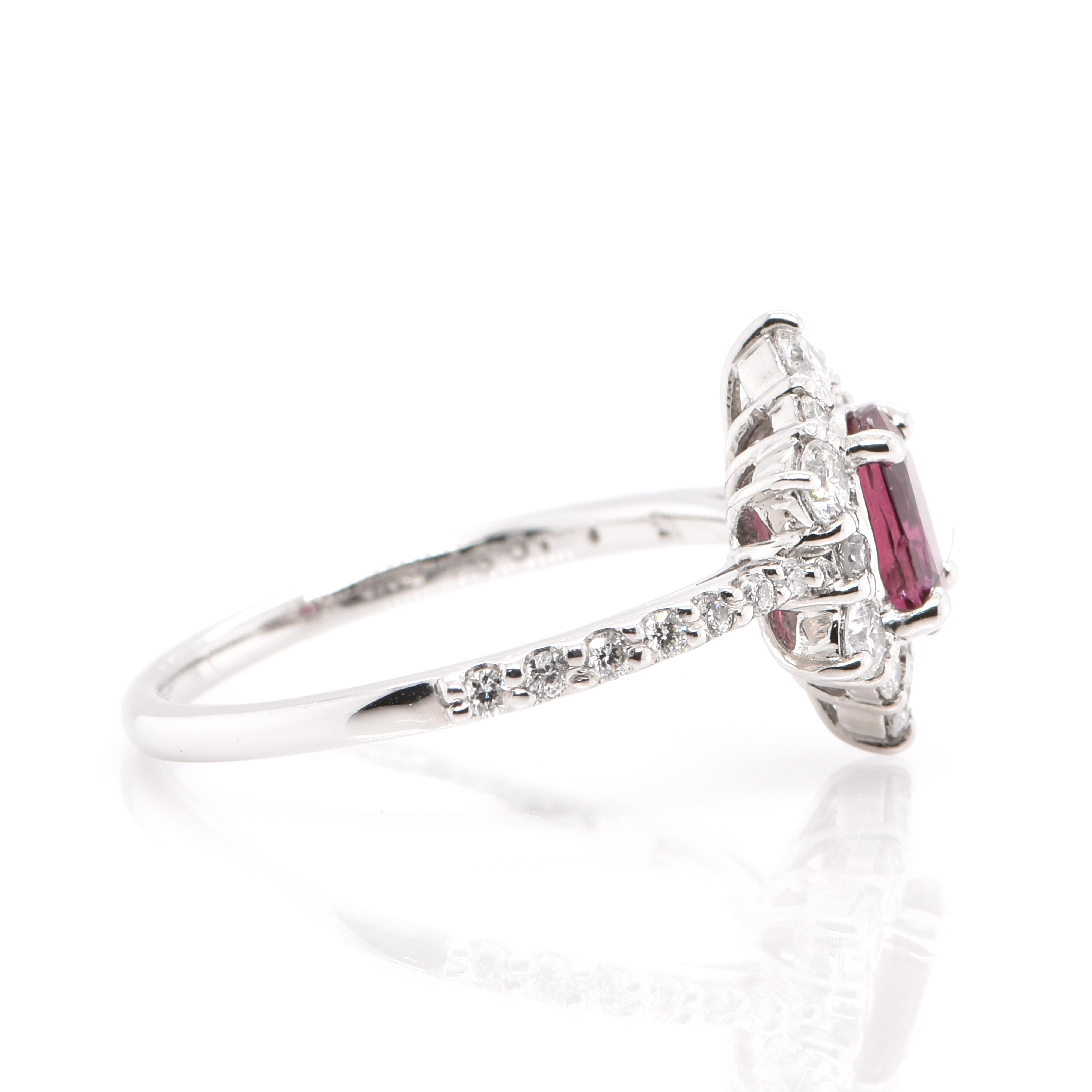 Oval Cut 0.97 Carat Natural Ruby and Diamond Ring Set in Platinum For Sale